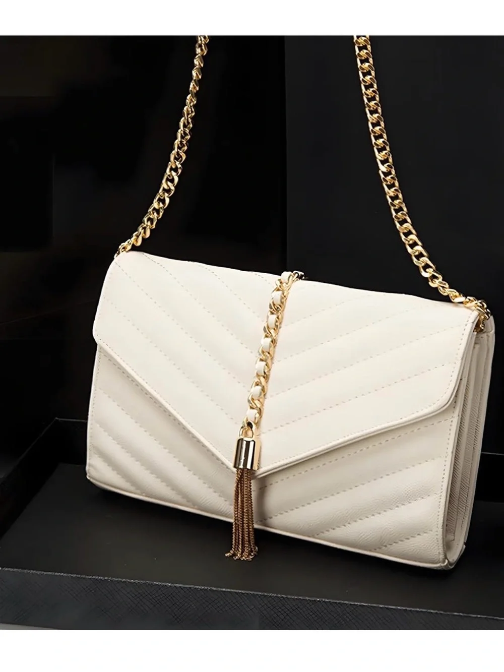 Elegant Cream Quilted Shoulder Bag with Gold Chain Tassel